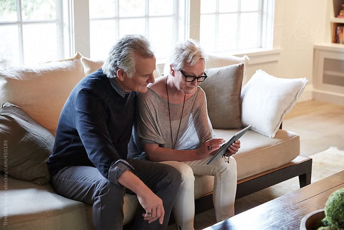 senior couple on tablet